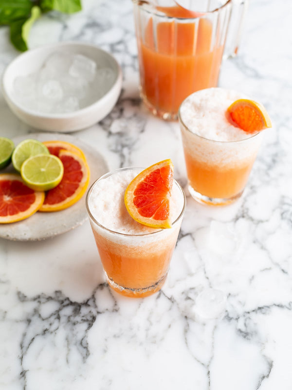 Grapefruit Paloma cocktail with dehydrated citrus garnish